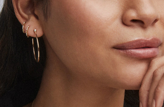 3 (boucles d'oreilles) en rang