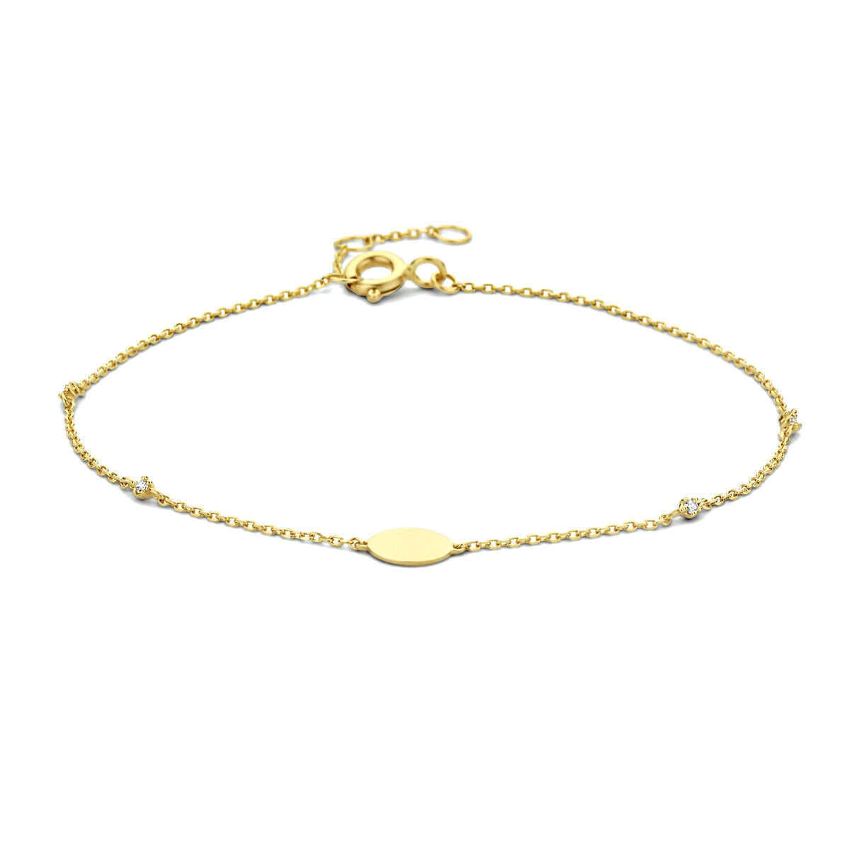Bracelet en or 14K avec zirconias, chaîne délicate et médaillon ovale.