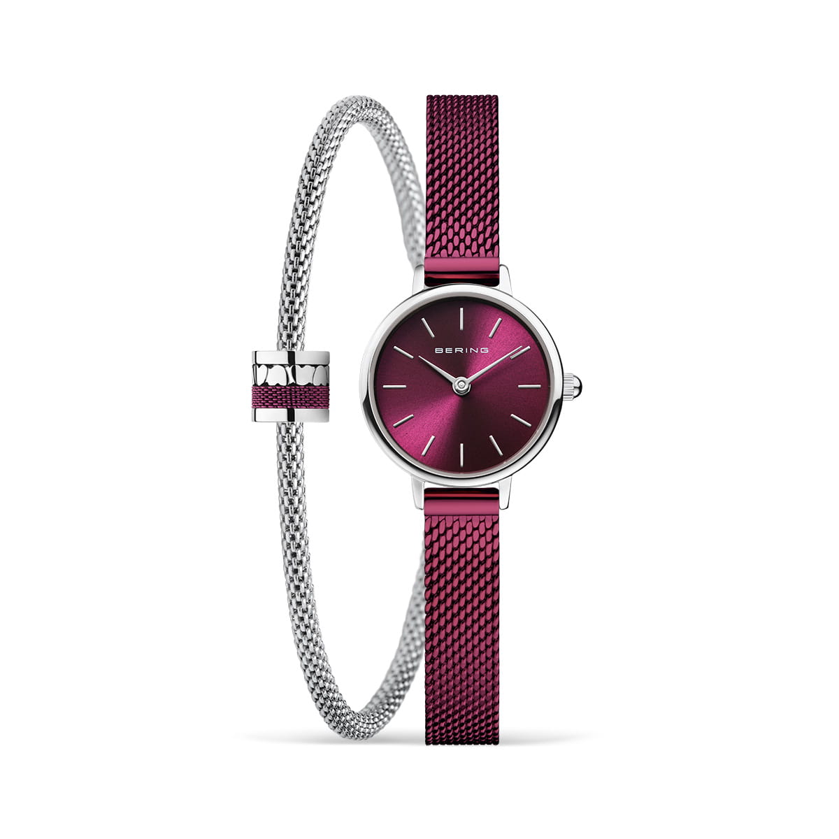 Montre avec un cadran violet et un bracelet en acier inoxydable argenté, accompagné d'un bracelet jonc assorti.