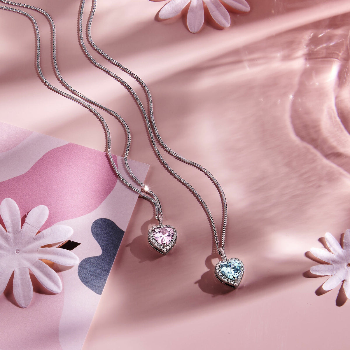 pendentif cœur en zircone couleur aquamarine halo argent rhodié