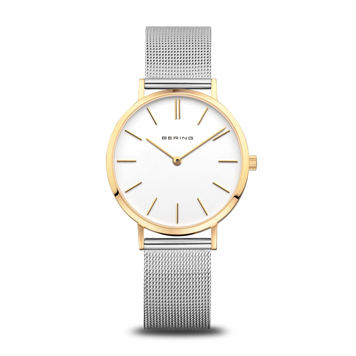Montre femme avec cadran blanc, boîtier doré et bracelet en maille argentée.