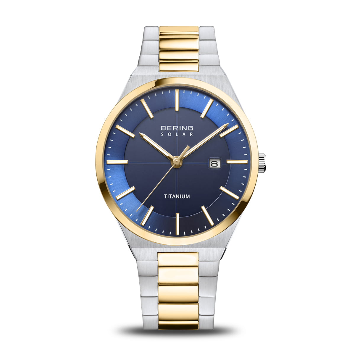 Montre en titane avec cadran bleu, boîtier argenté et bracelet doré et argenté.