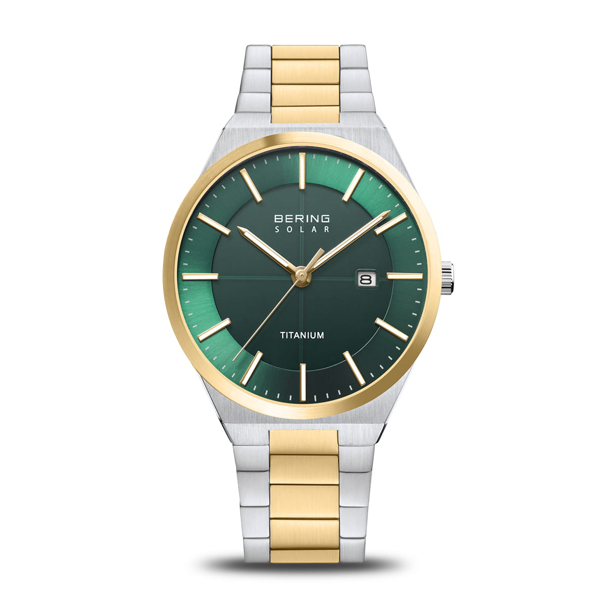 Montre en titane avec bracelet bicolore argenté et doré, cadran vert dégradé et index dorés.