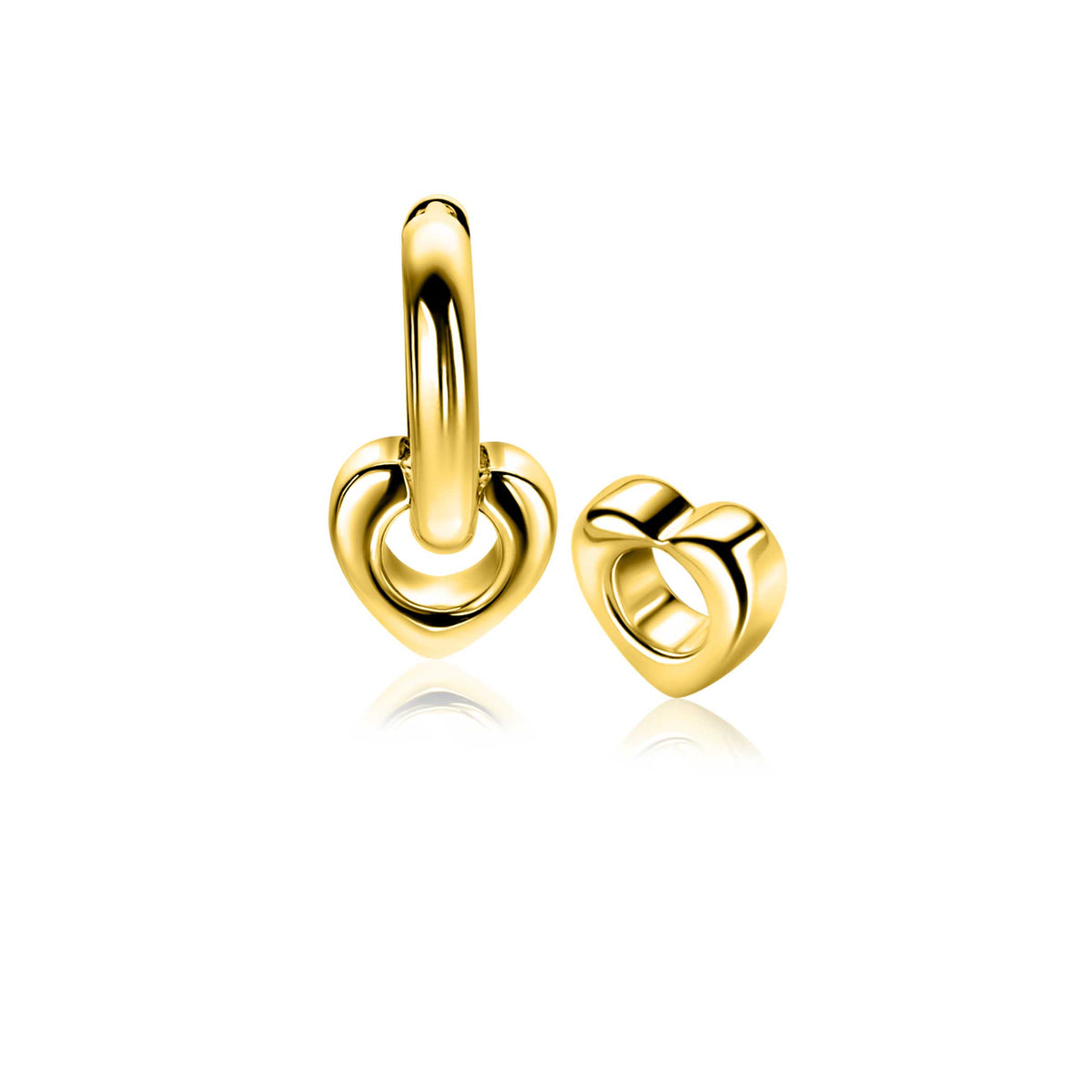 Boucles d'oreilles en argent doré en forme de cœur, avec un design entrelacé.