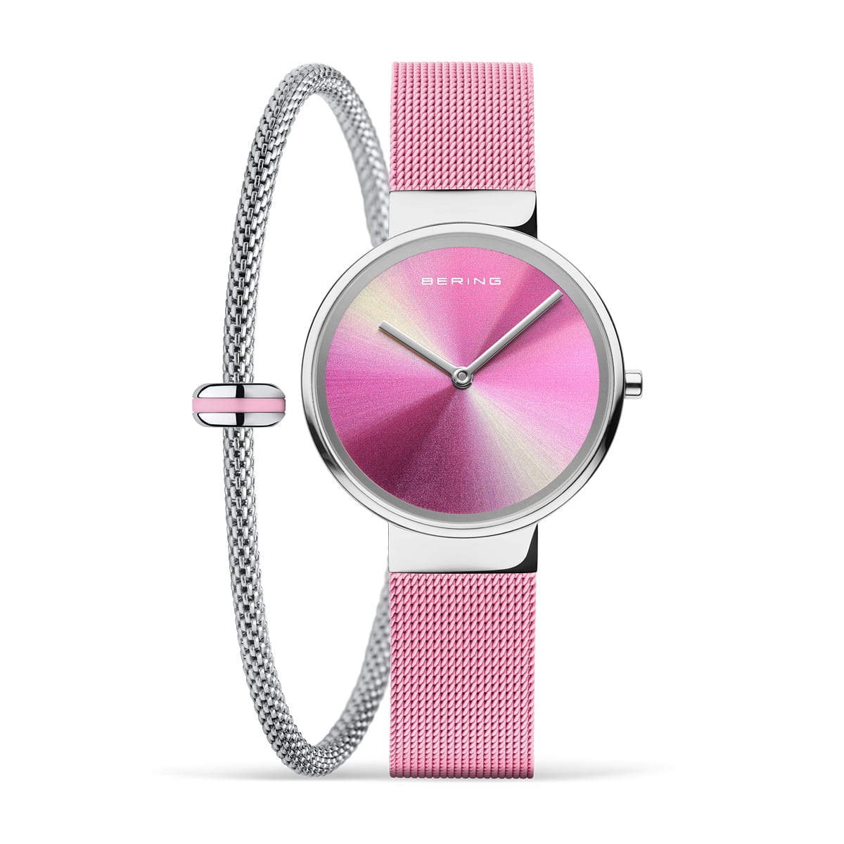 Montre pour dames avec un cadran multicolore et un bracelet en maille argentée.