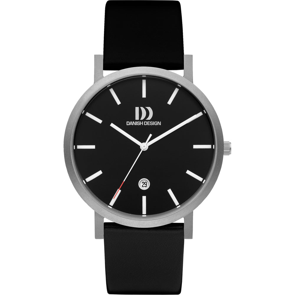 Montre à cadran noir, boîtier argenté et bracelet en silicone noir.
