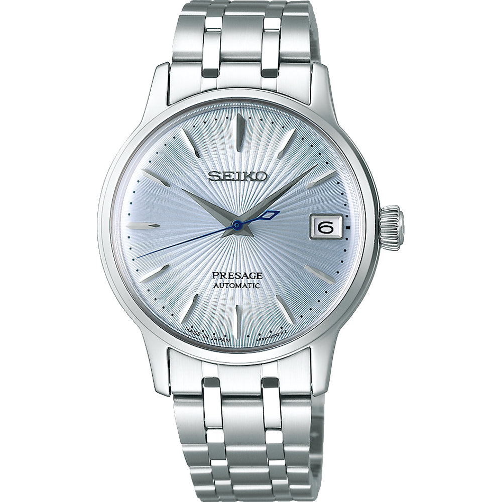 Montre Seiko Presage pour femme avec cadran argenté, boîtier et bracelet en acier inoxydable, affichage de la date.