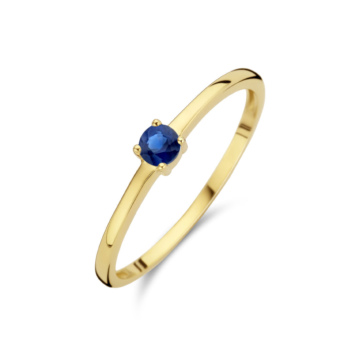bague en or jaune 14K avec une pierre de naissance saphir bleue