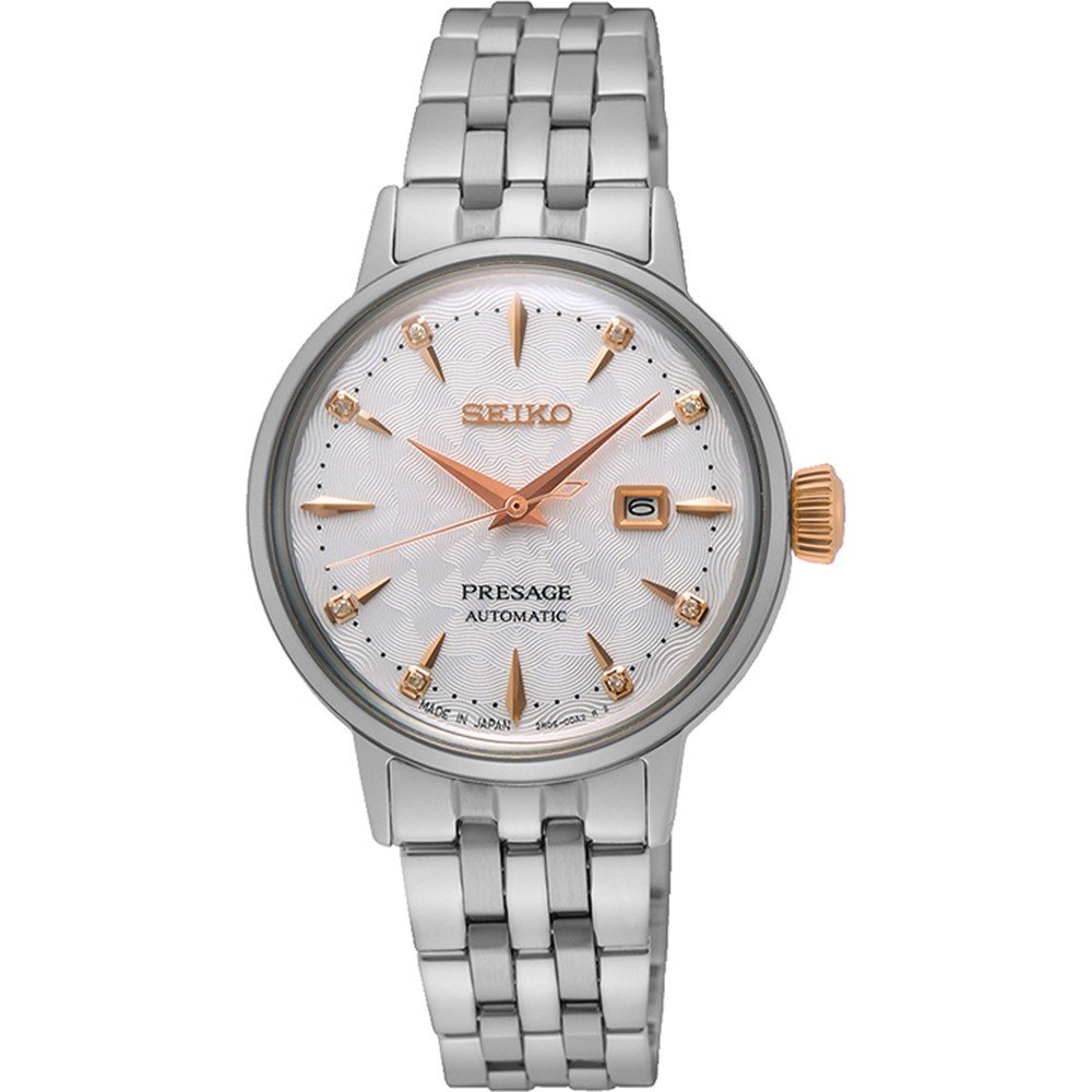 Montre Seiko Presage pour femme avec boîtier argenté, cadran blanc et bracelet en acier inoxydable.