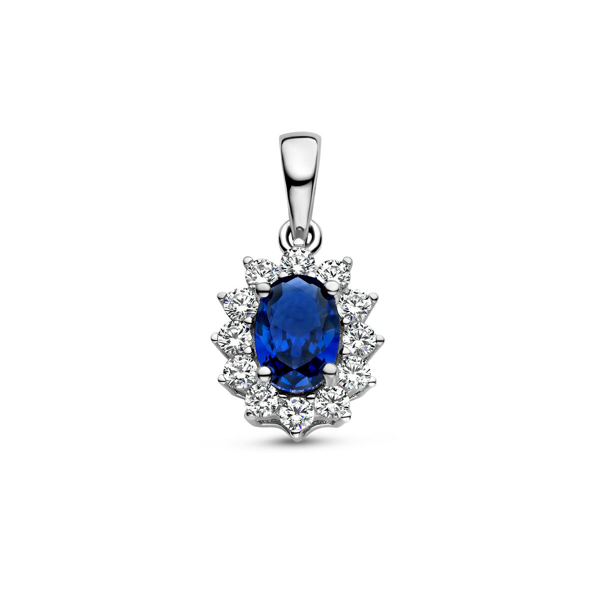 Pendentif en argent rhodié avec un saphir bleu entouré de zirconiums blancs.