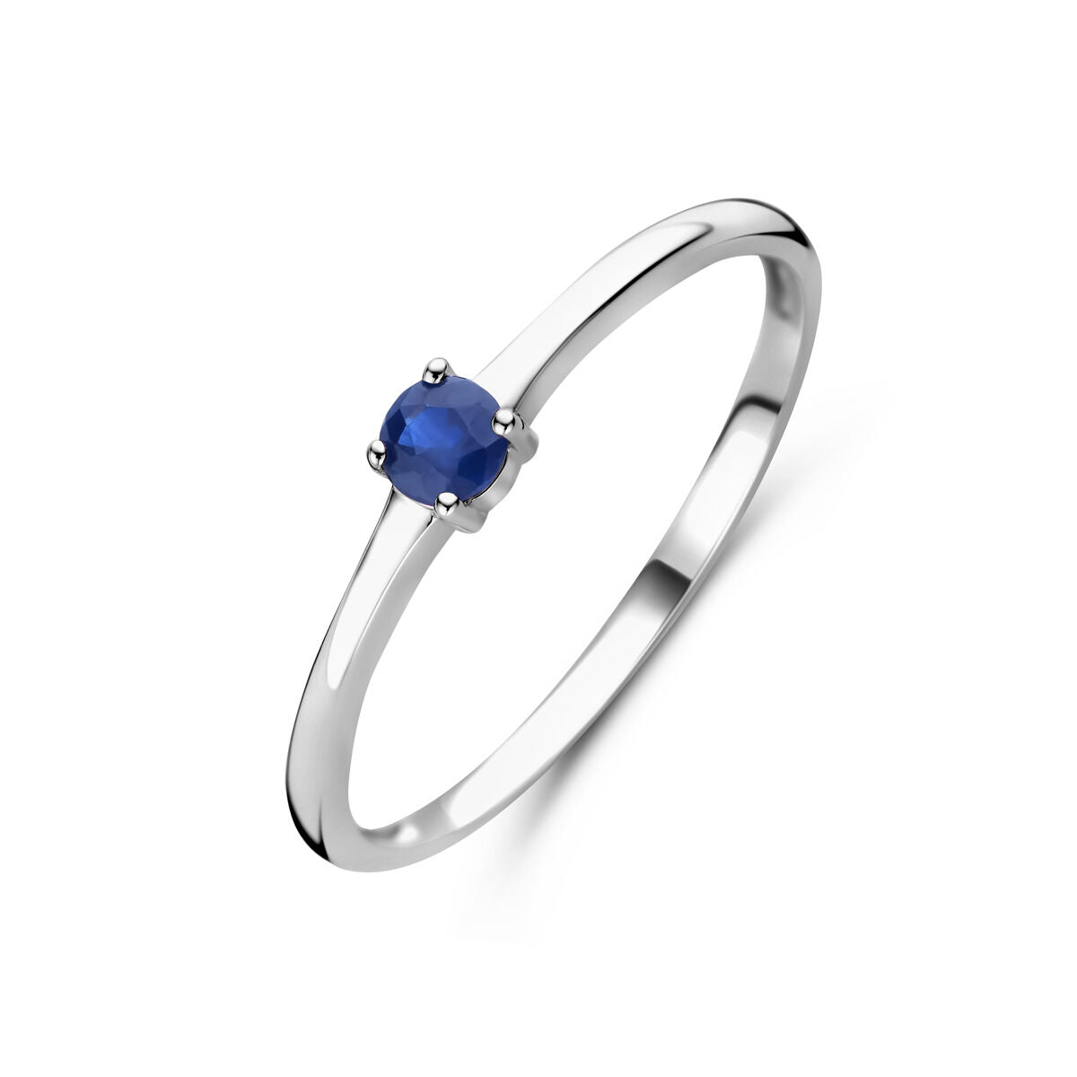 Bague en argent rhodié avec une pierre de naissance en saphir bleu.