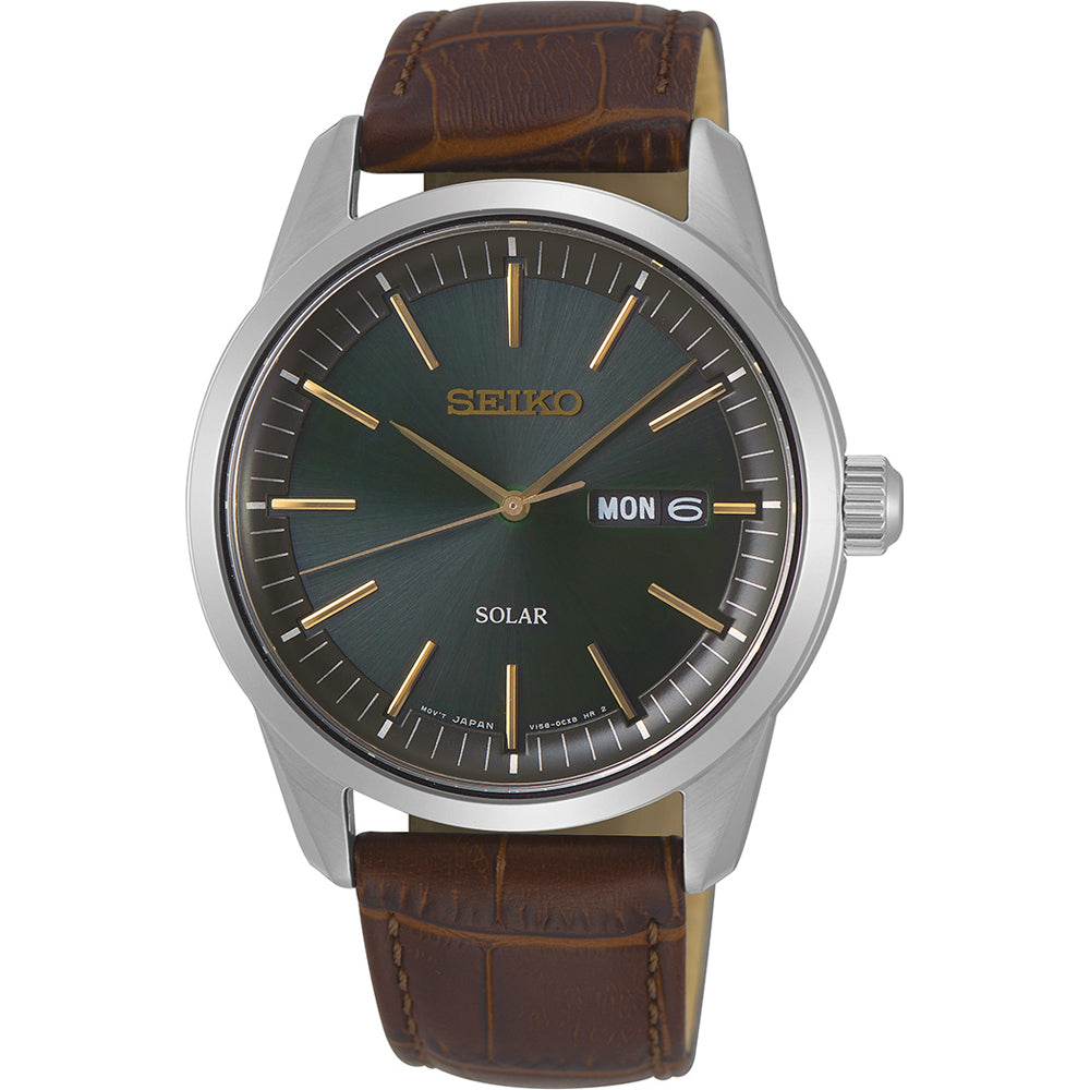 Montre pour homme Seiko avec cadran vert, boîtier en acier inoxydable et bracelet en cuir marron.