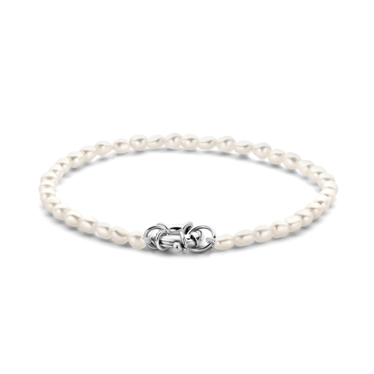 Bracelet en perles blanches avec un grand fermoir en argent rhodié.