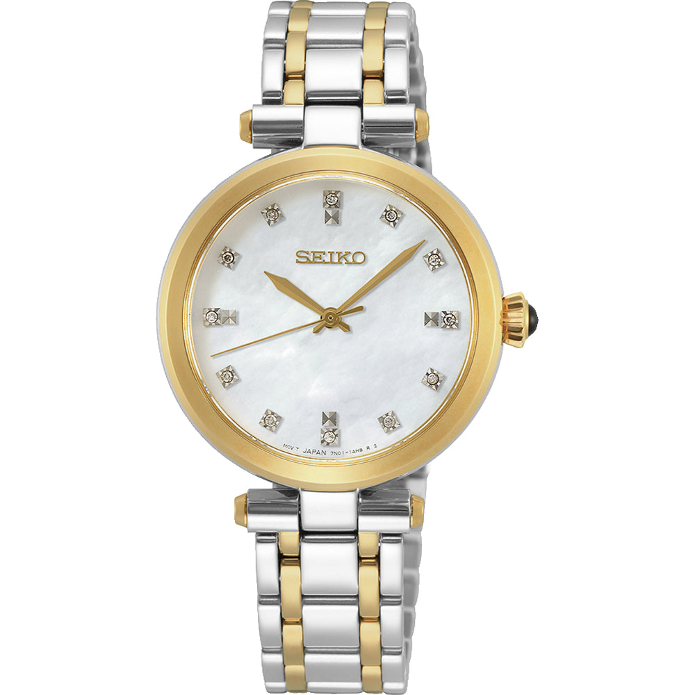 Montre Seiko pour femme avec boîtier doré et bracelet en acier inoxydable argenté, cadran nacré et index en strass.