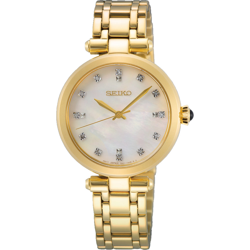 Montre dorée pour femme avec cadran nacré et cristaux, bracelet en maillons.