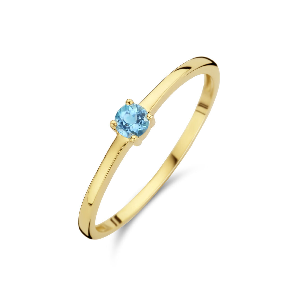 Bague en or jaune 14K avec une pierre précieuse bleue topaze.