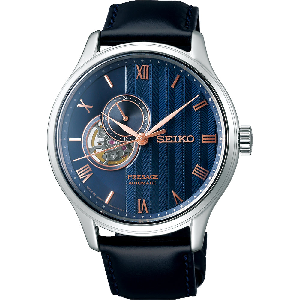 Montre pour homme Seiko avec cadran bleu, boîtier en acier inoxydable et bracelet en cuir noir.