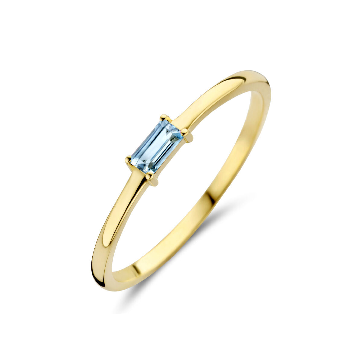 Bague en or jaune 14K avec une pierre de naissance topaze de couleur bleue.