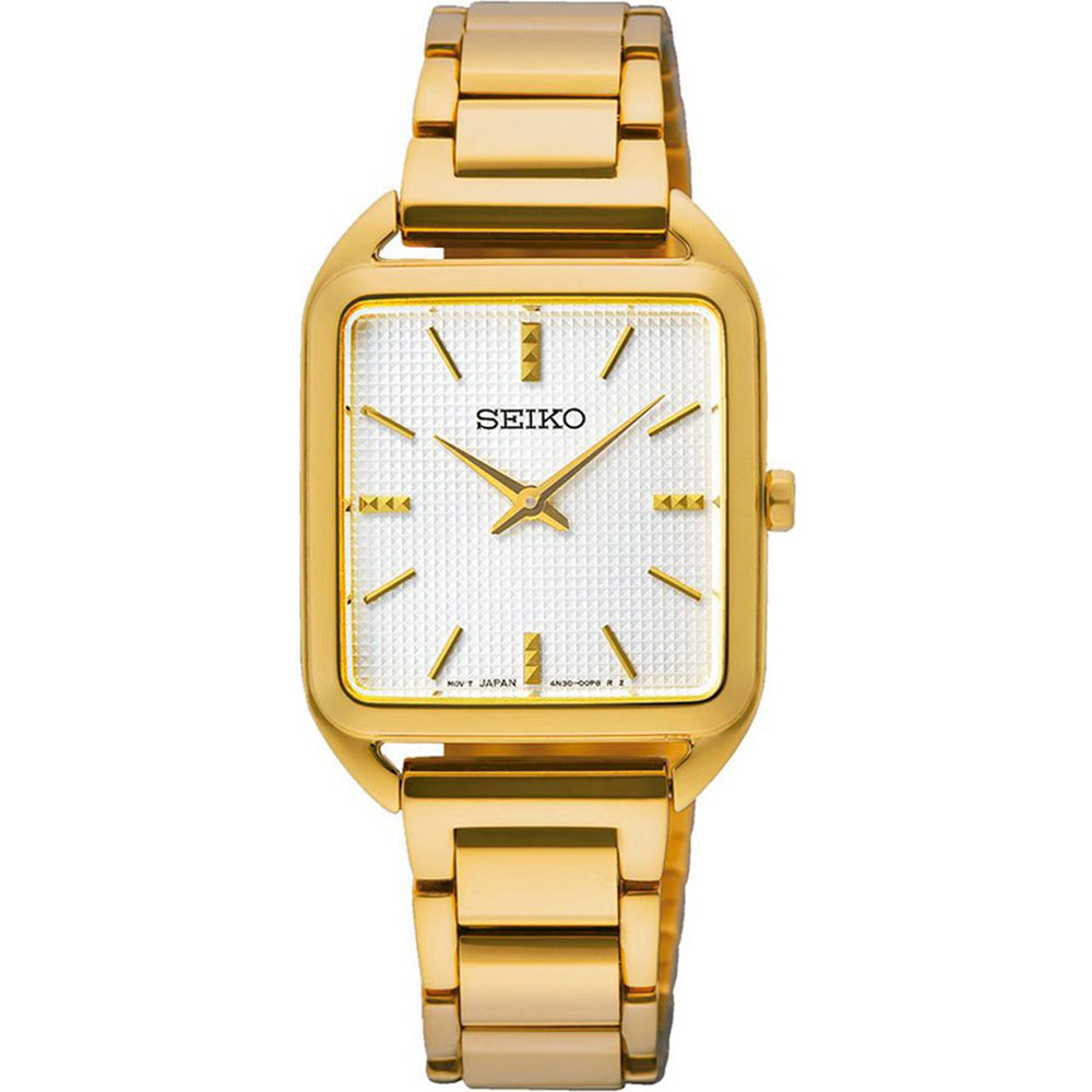Montre dorée pour femme avec un cadran blanc et un bracelet en métal brillant.