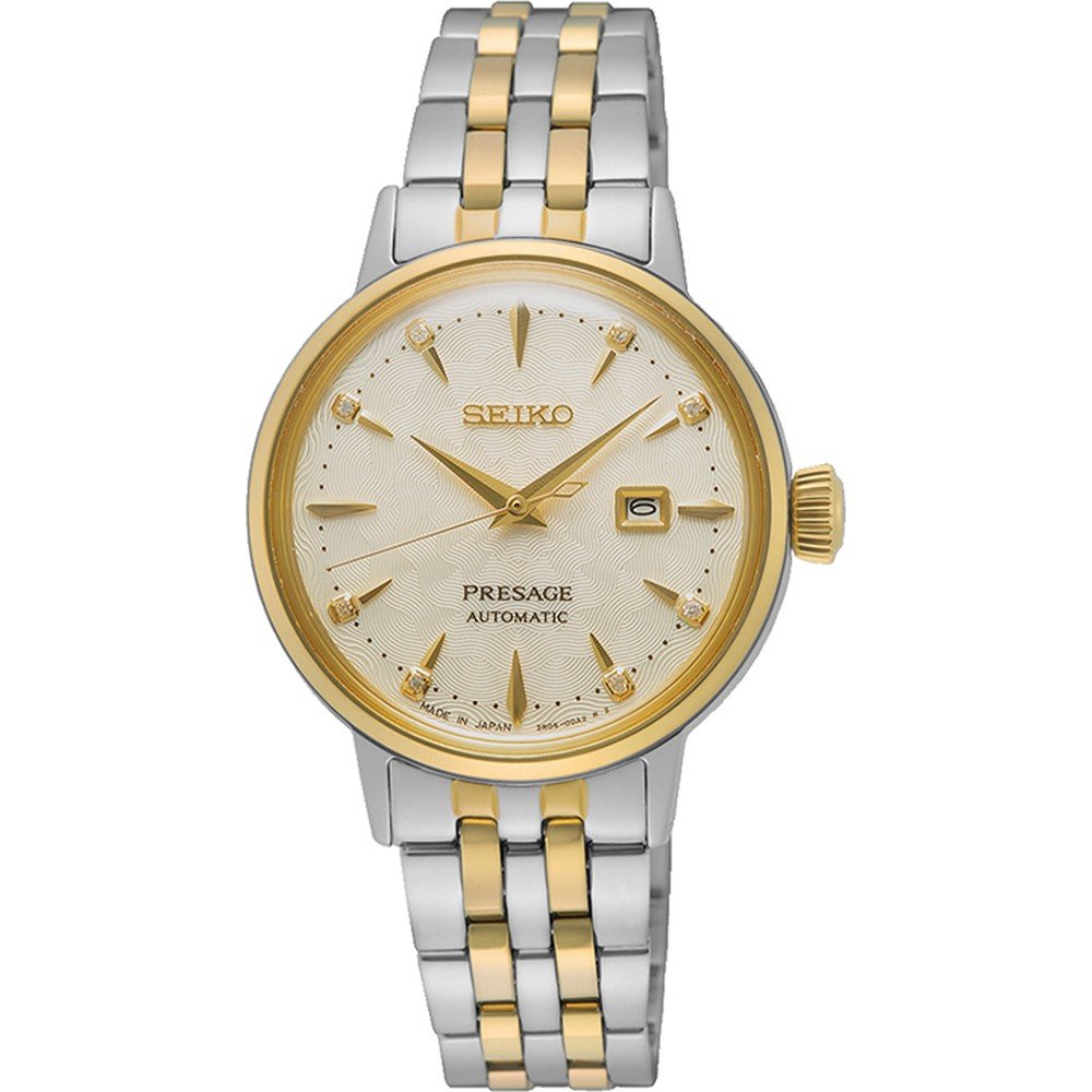 Montre Seiko Presage pour femme avec boîtier argenté et doré, cadran doré et bracelet en acier.