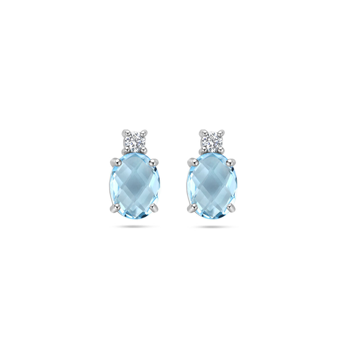 Boucles d'oreilles en topaze bleue et zirconium, argent rhodié, forme ovale.