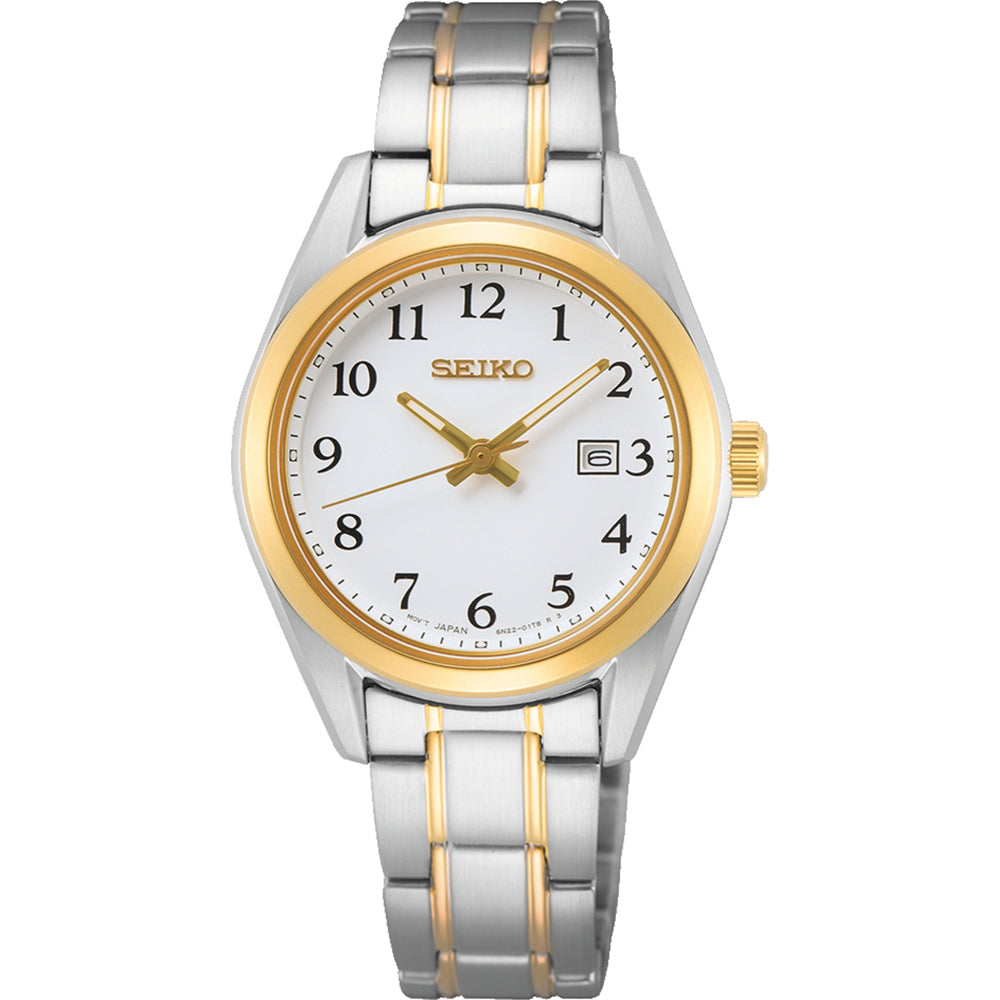 Montre pour femme Seiko avec boîtier argenté et doré, cadran blanc et bracelet en acier inoxydable.