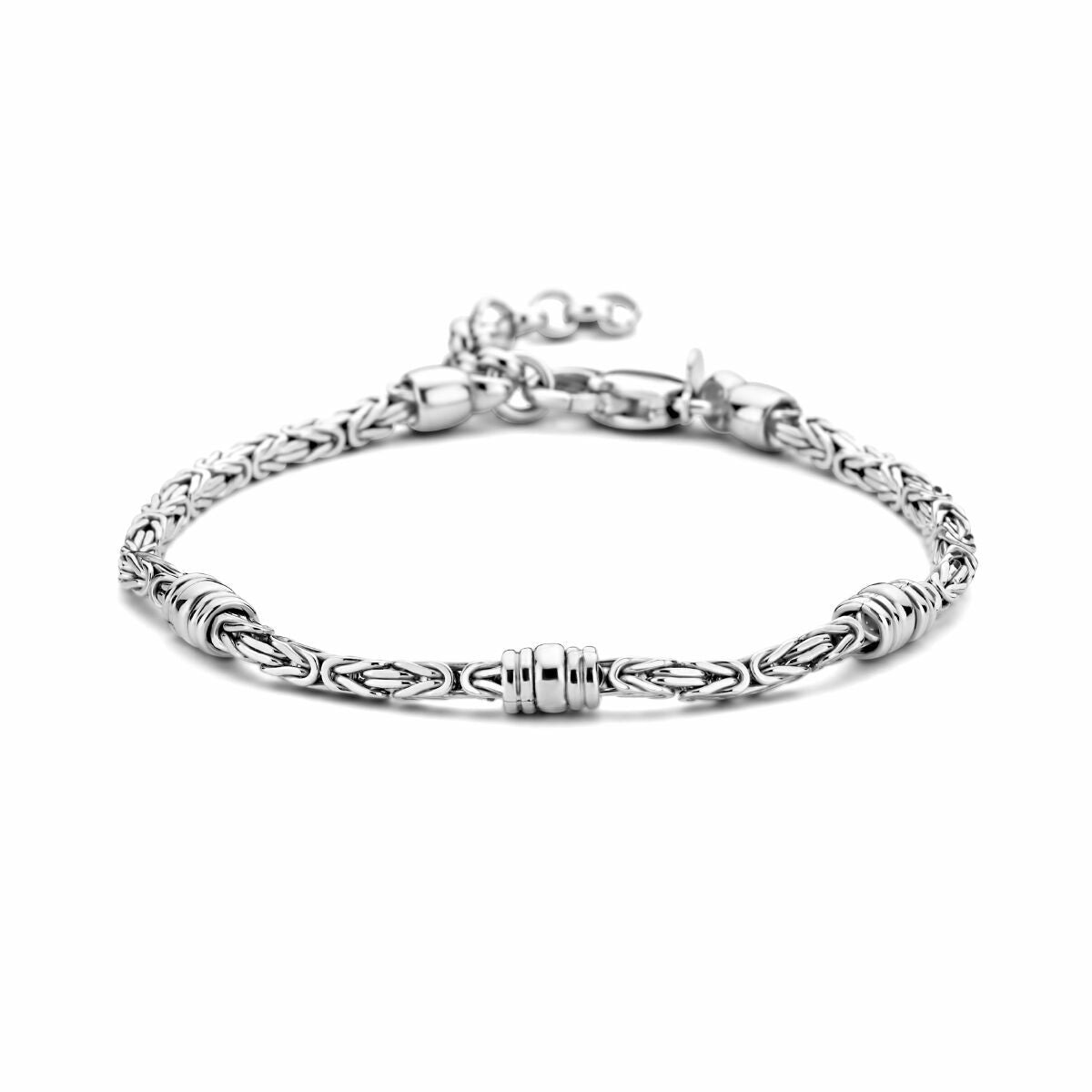 Bracelet en argent rhodié de 18 + 3 cm avec des maillons décoratifs de 2,5 mm.