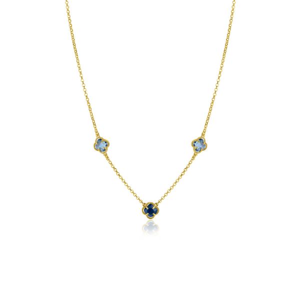 Collier doré avec trois pendentifs en forme de fleur, ornés de pierres bleues.