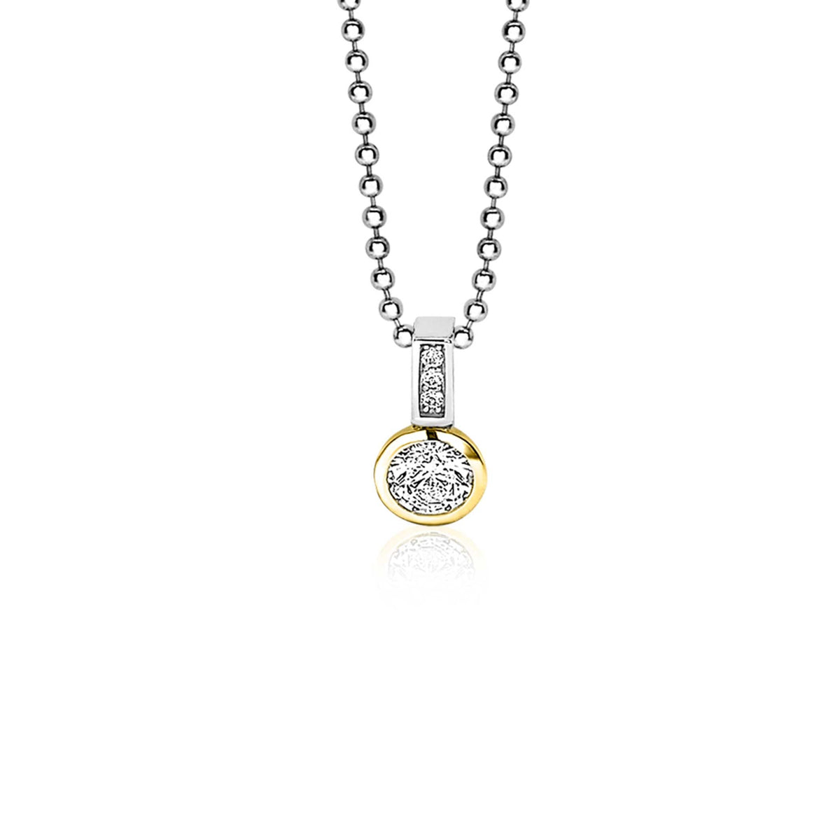 Pendentif en or jaune et argent avec un motif rond et des zircons.