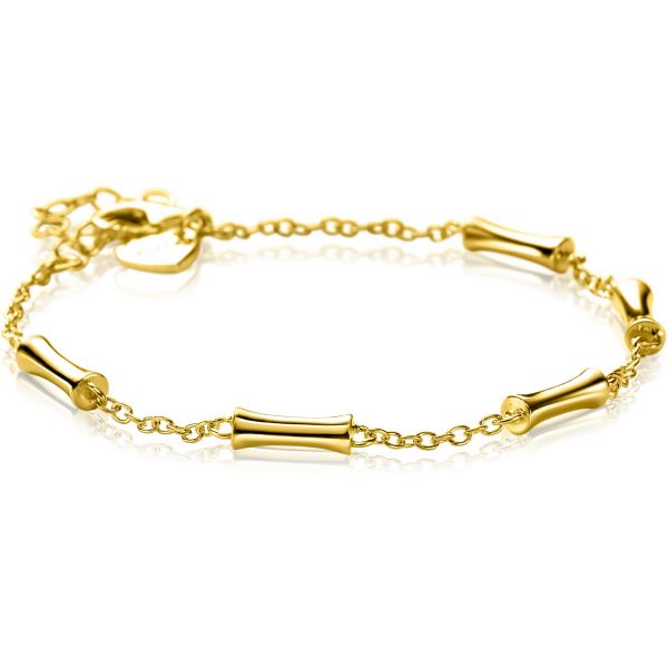 Bracelet en argent avec des éléments en forme de barres et un fermoir en cœur.