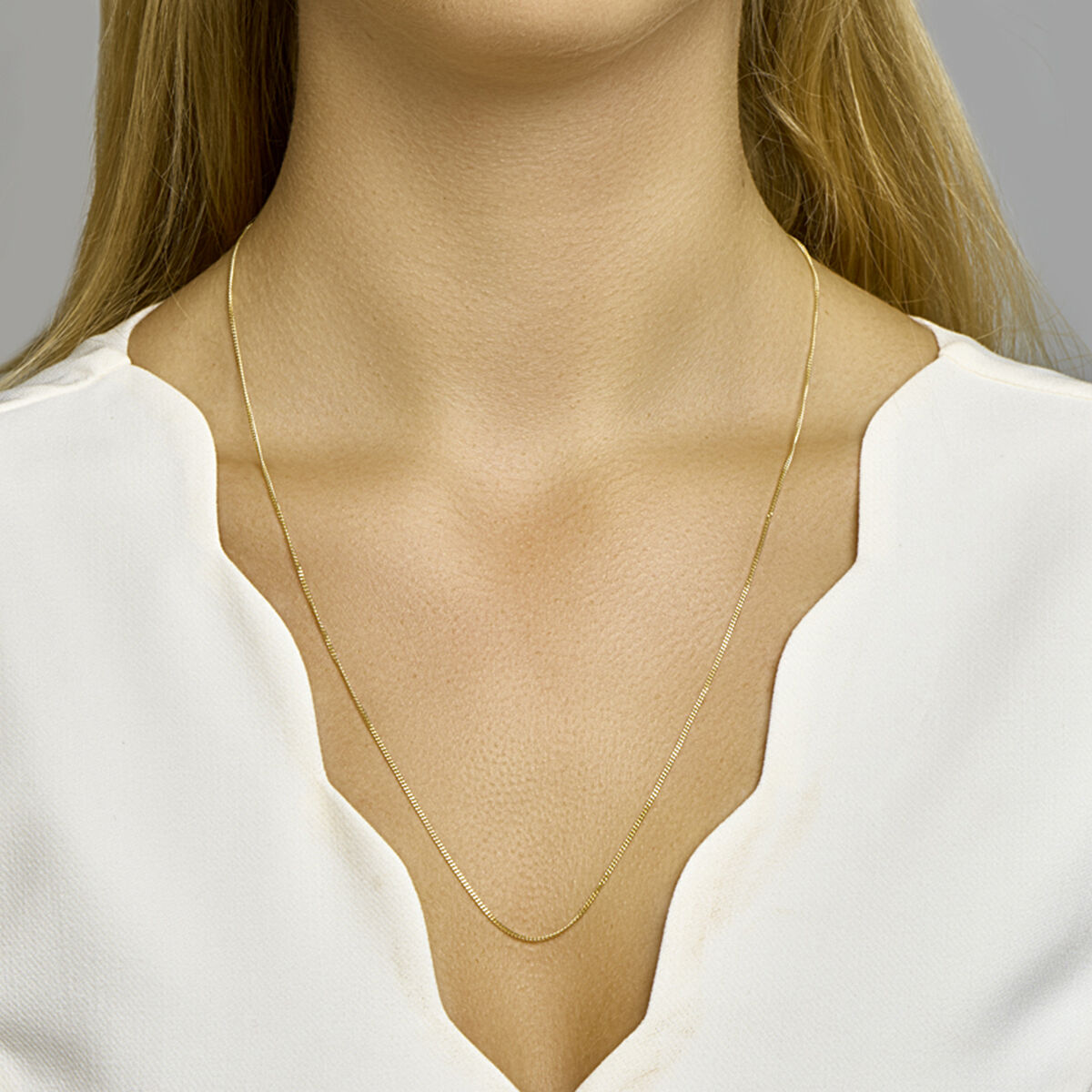 Collier en or jaune 18k avec mailles gourmette taillées