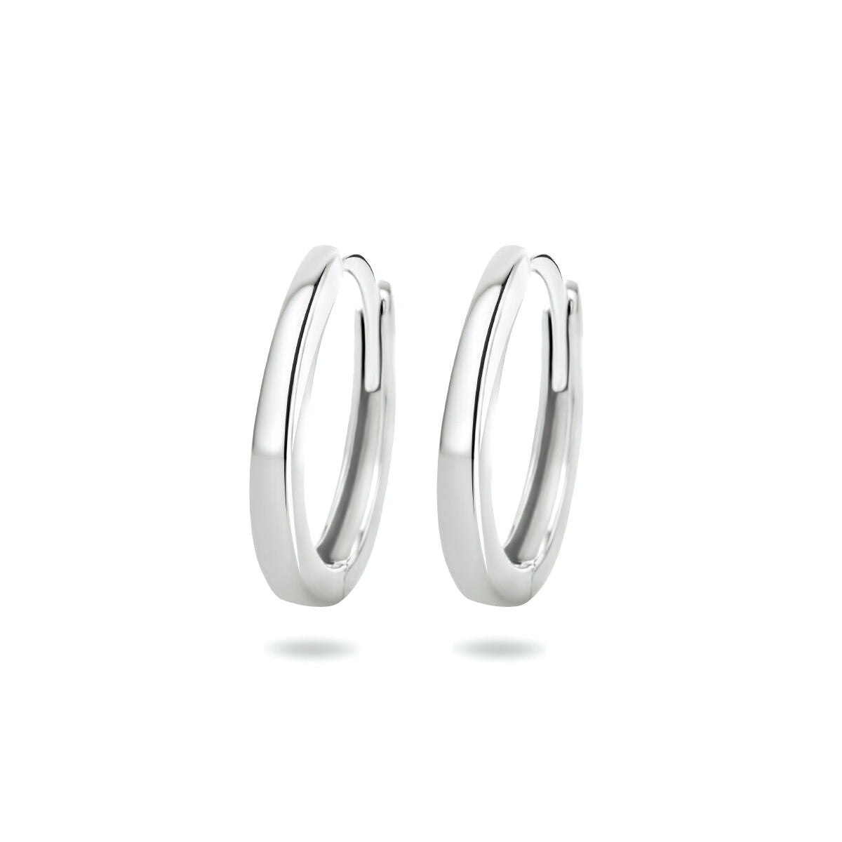 Boucles d'oreilles en or blanc 14K, de forme ronde et lisse, avec un fermoir à clip.