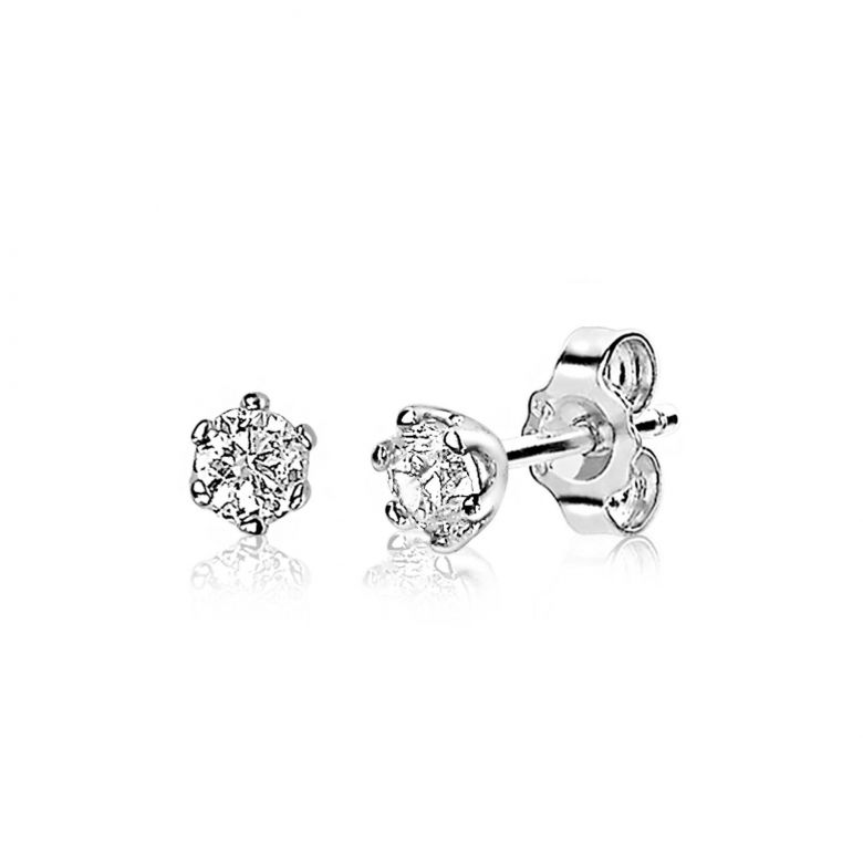 Boucles d'oreilles en argent avec un design en fleur et des pierres scintillantes.