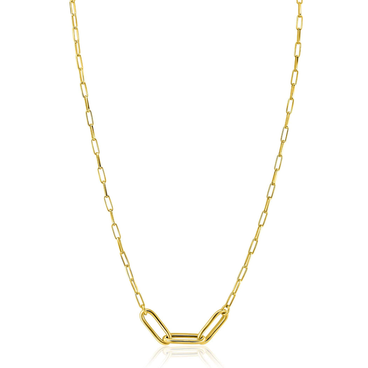 Collier en métal doré avec maillons ovales et un élément central allongé.