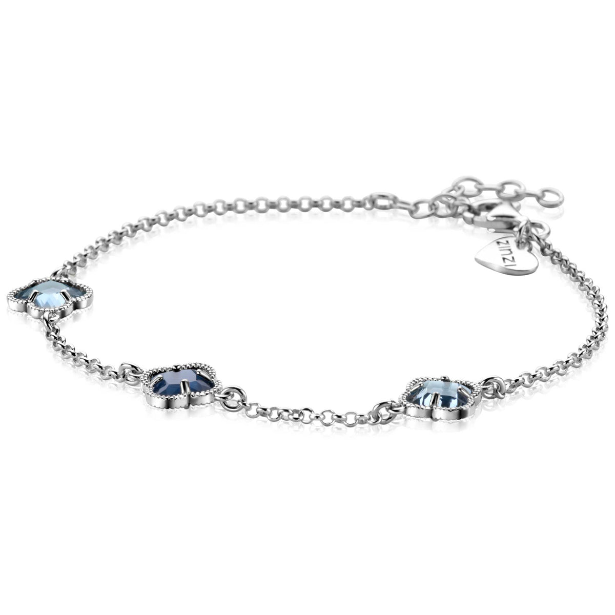Bracelet en argent avec trois pierres bleues en forme de fleur.