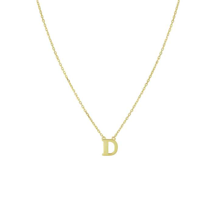 De Van der Kooij Collectie Gouden dames ketting letter 14K heeft een delicaat geelgouden anker collier met een enkele kleine gepersonaliseerde letterhanger D, gecentreerd afgebeeld tegen een witte achtergrond.