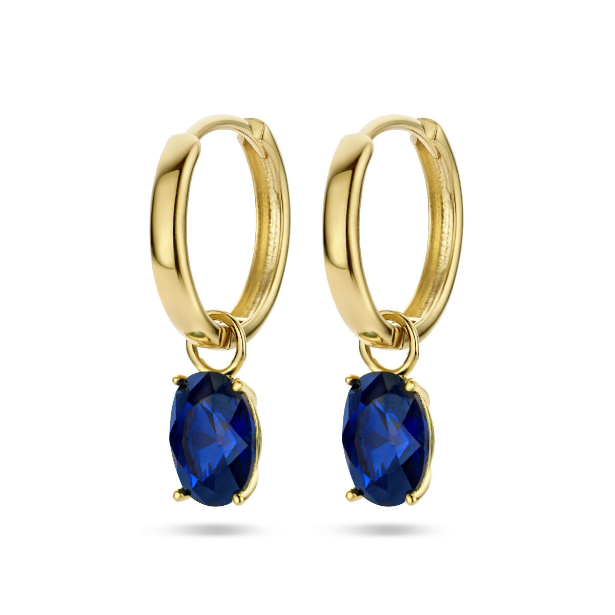 Boucles d'oreilles en or jaune 14K avec zirconium bleu en forme ovale.