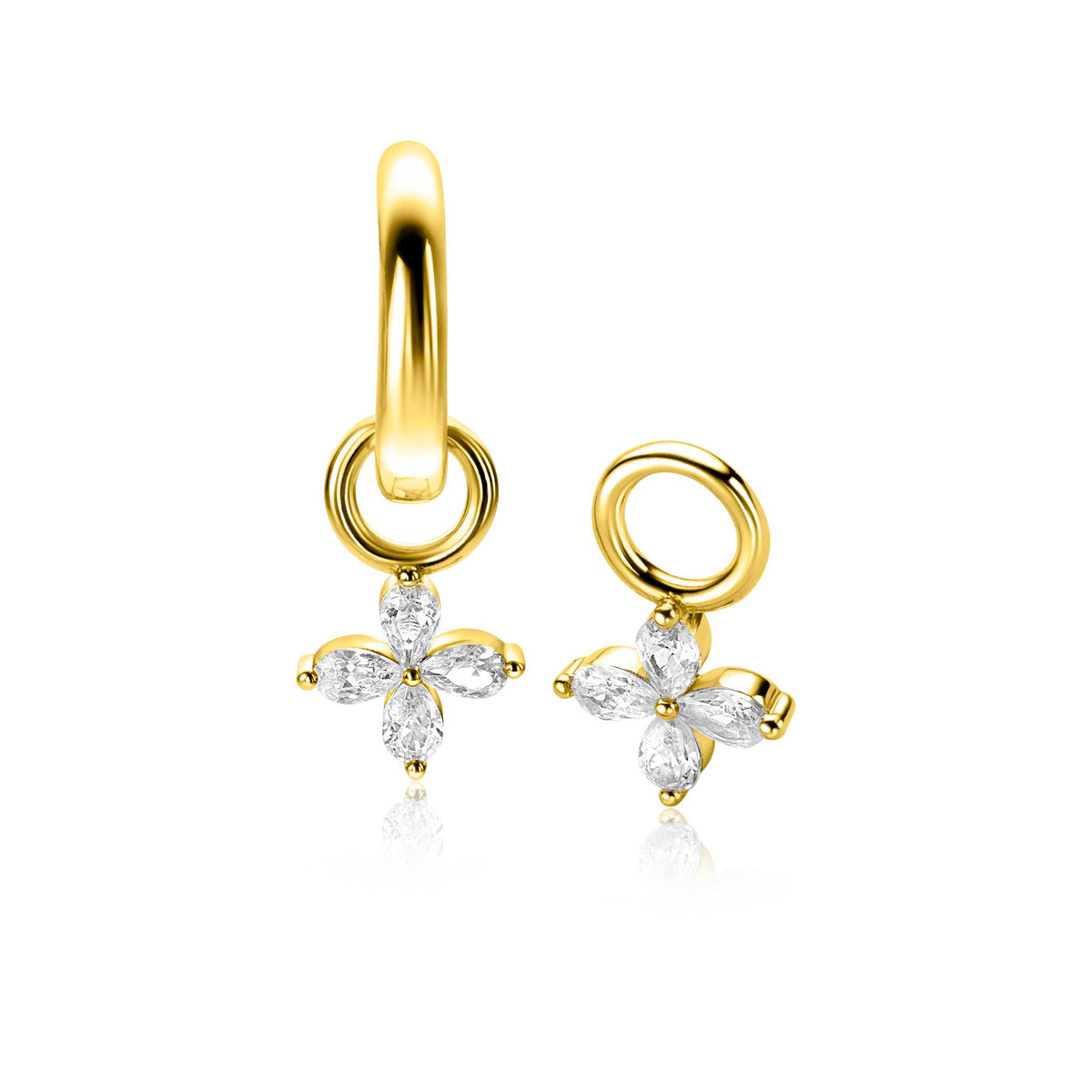 Boucles d'oreilles en argent doré avec un motif floral orné de pierres brillantes.