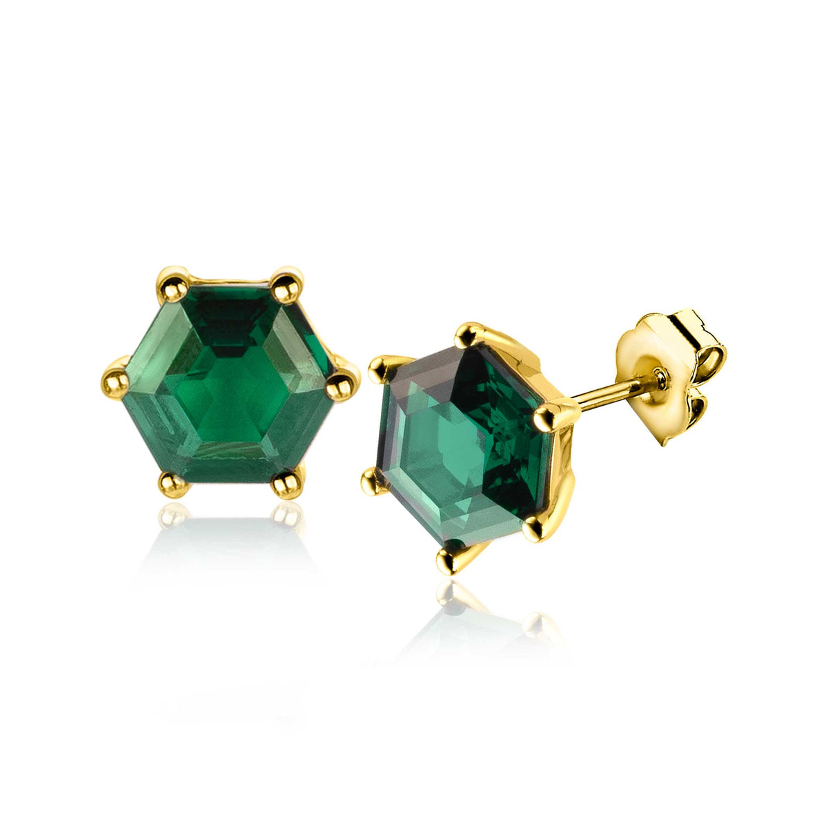 Boucles d'oreilles dorées avec pierres vertes en forme d'hexagone.