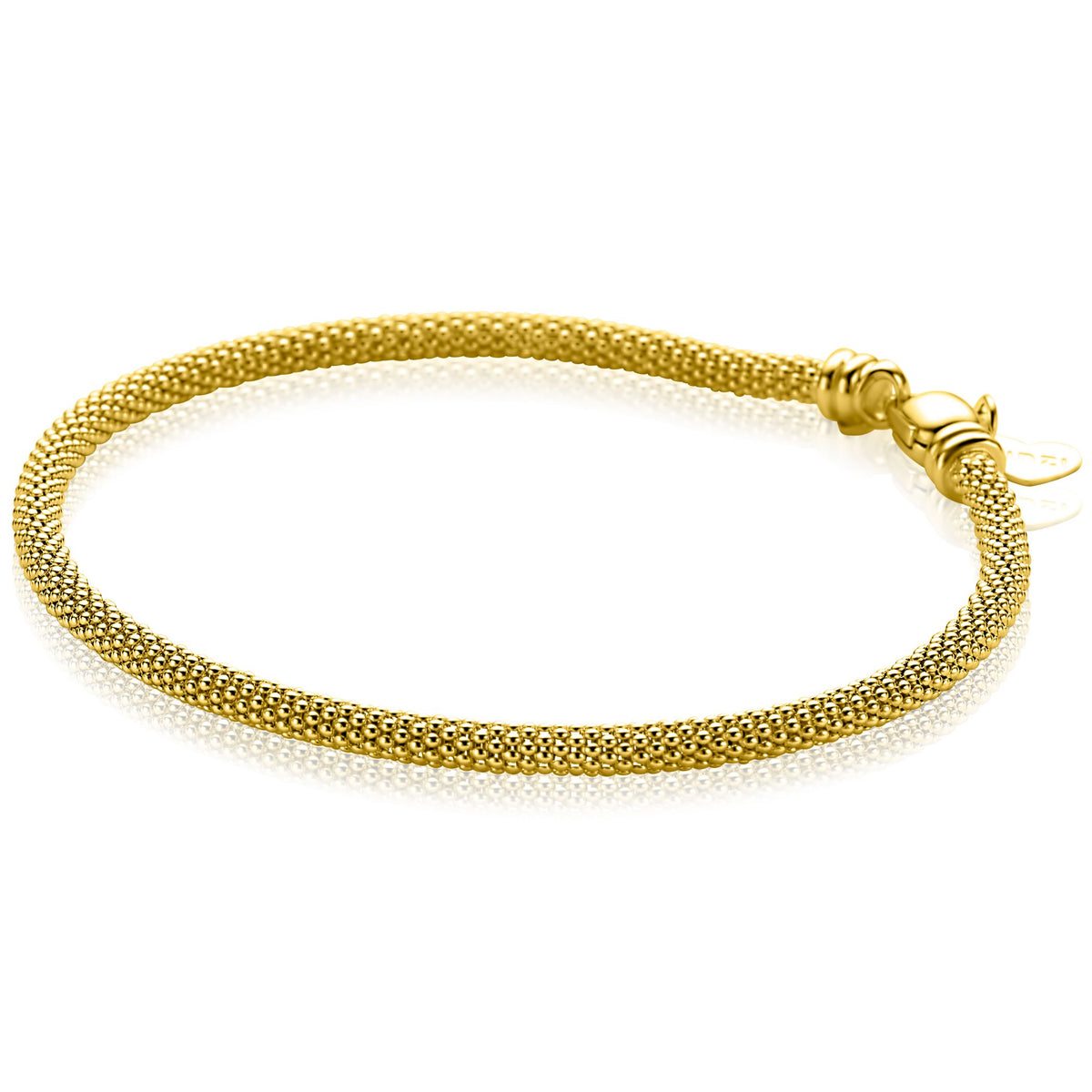 Bracelet doré en mailles, finition lisse, fermoir en métal.