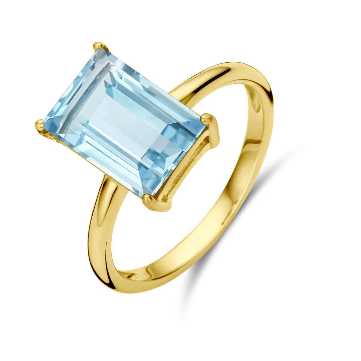 Bague en or jaune 14K avec topaze bleue rectangulaire.