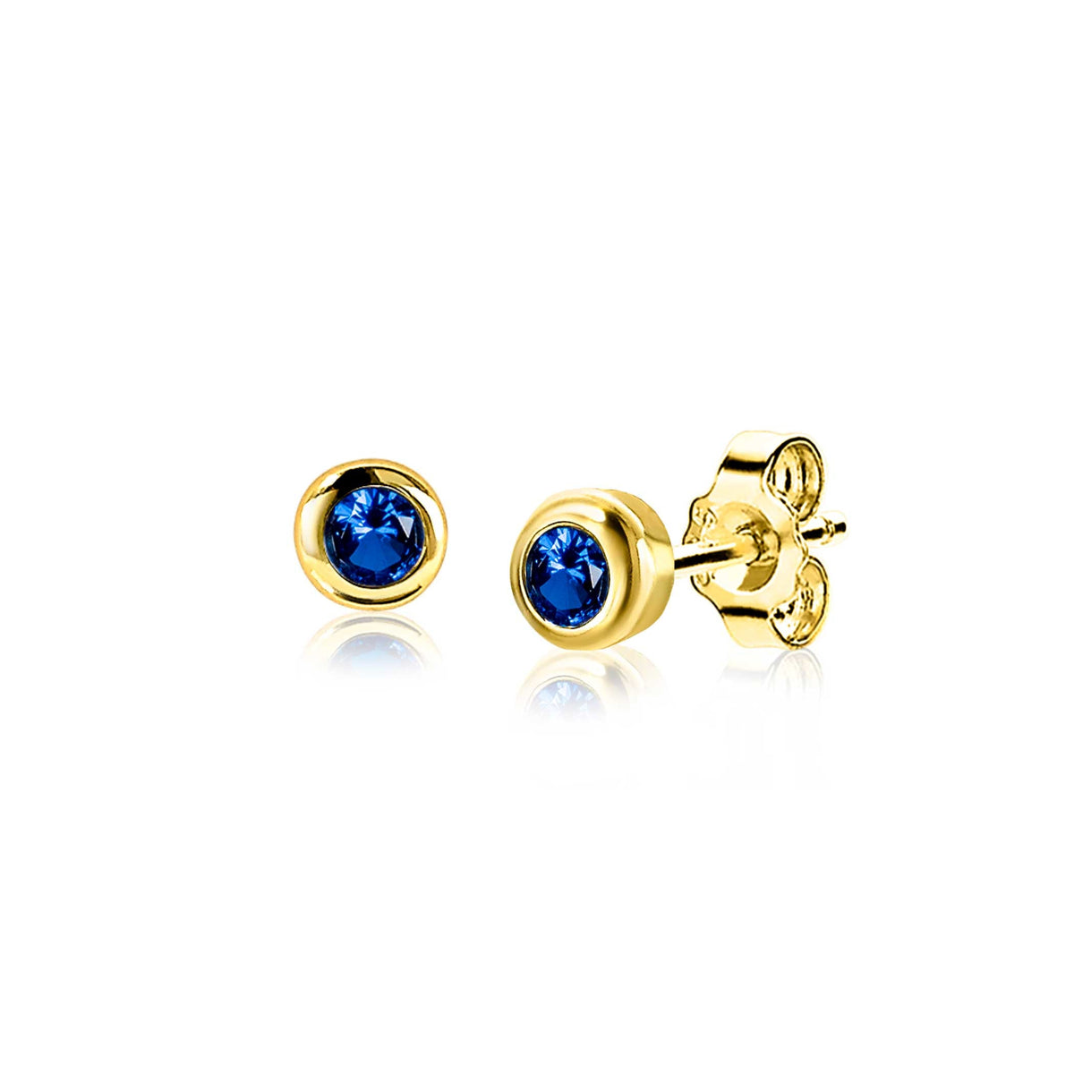Boucles d'oreilles dorées avec un cristal bleu en forme de sphère.