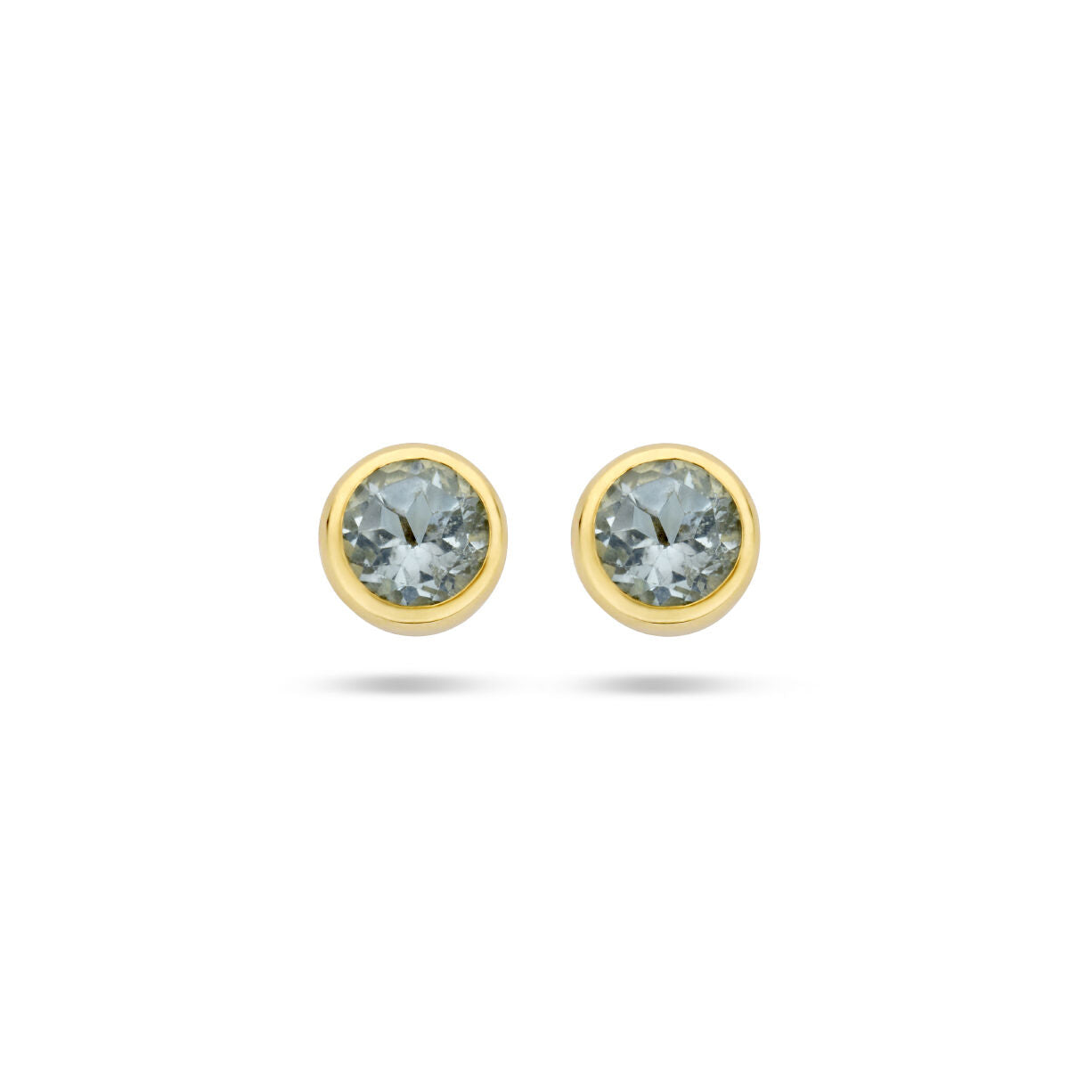 Boucles d'oreilles en or jaune 14K avec topazes bleues.