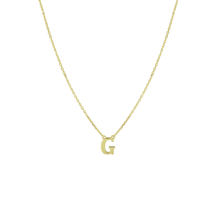 De Gouden dames ketting letter 14K van Van der Kooij Collectie is een verfijnd geelgouden collier met gepersonaliseerde letter G, ideaal als sieradencadeau voor dames bij elke gelegenheid.