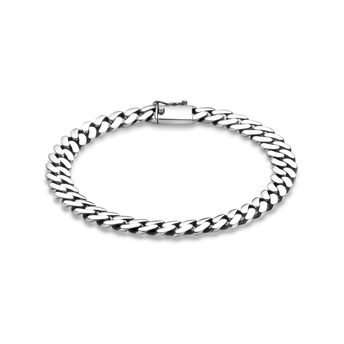 Zilveren geoxideerde armband met een gourmette schakel van 7,5 mm breed.