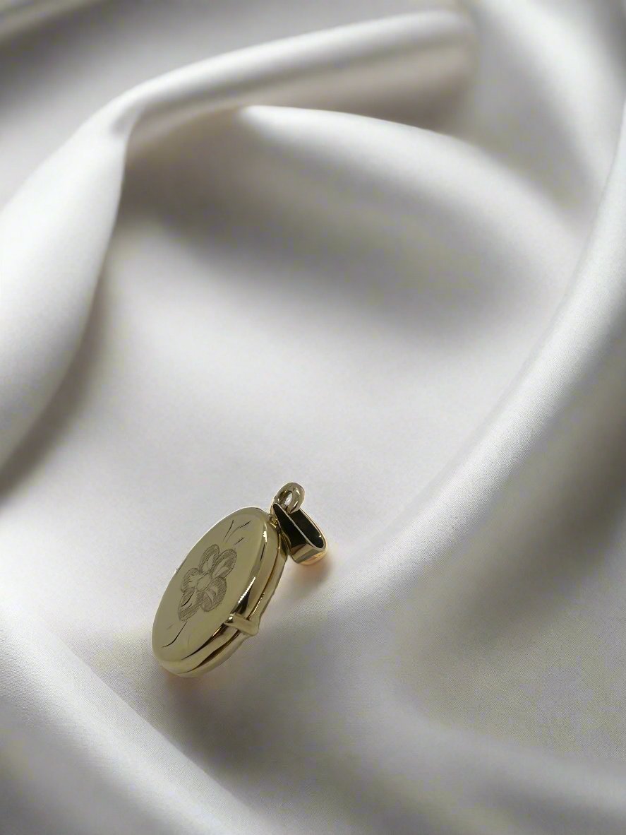 pendentif en or vintage 14k avec motif floral, pesant 3,4 g.