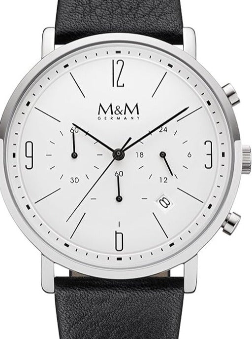 Montre M&M avec un cadran blanc, boîtier en acier inoxydable et bracelet en cuir noir.