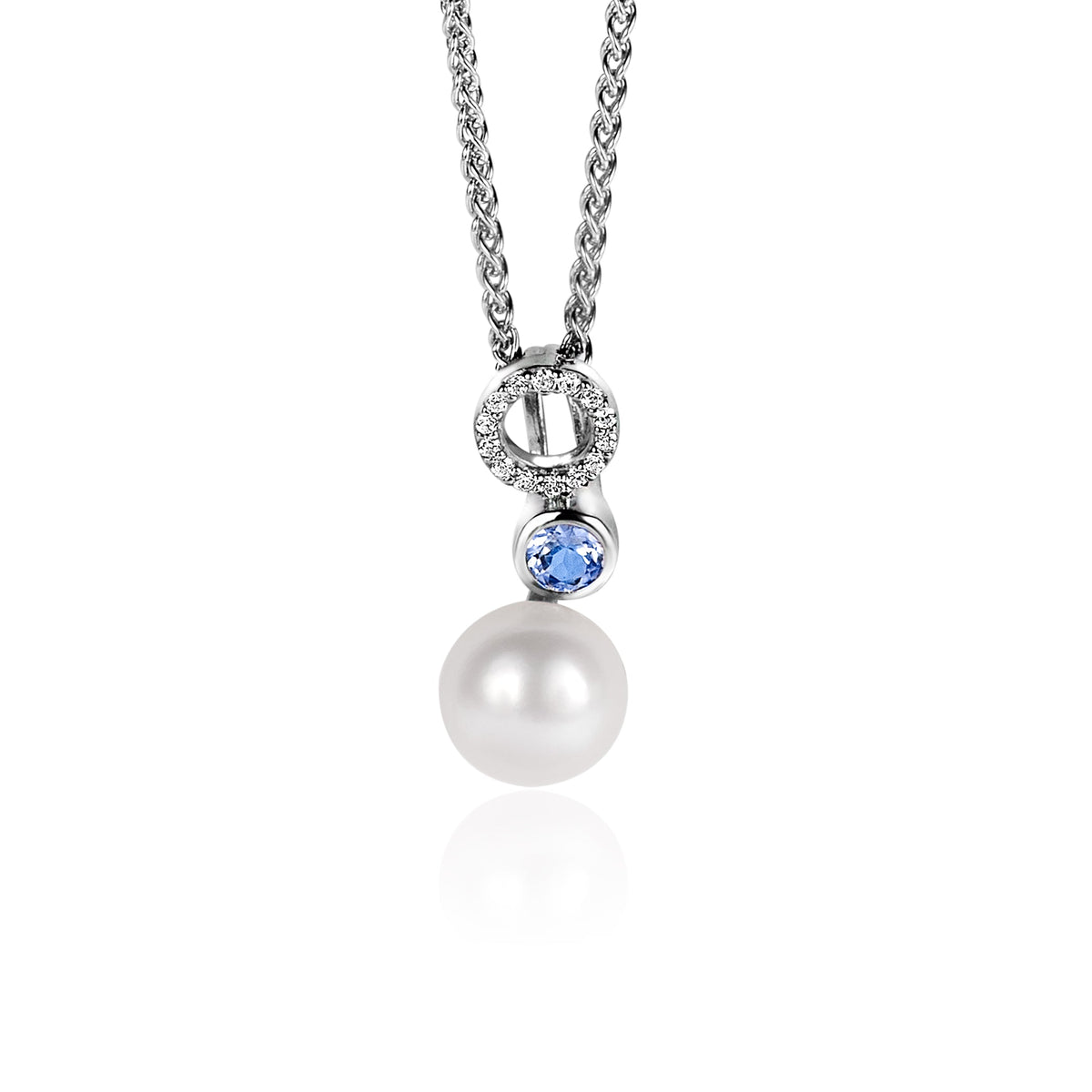 Pendentif en argent avec perle blanche et pierre bleue, suspendu à une chaîne.