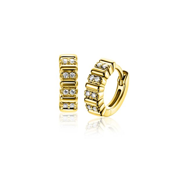 Boucles d'oreilles en argent avec des cristaux, de forme ronde et finition brillante.