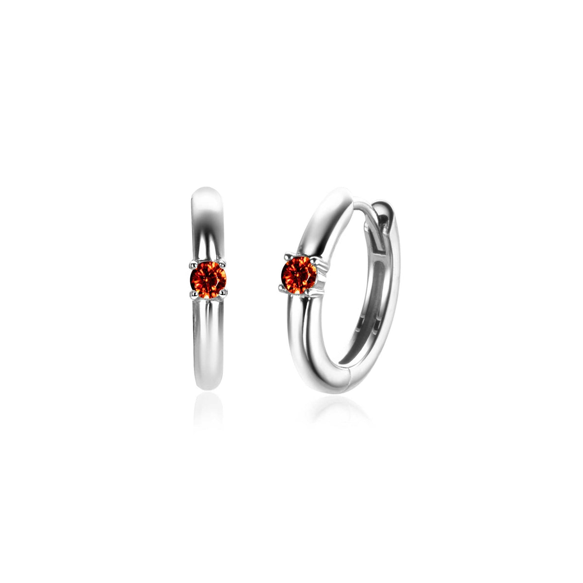 Boucles d'oreilles en argent avec un zircon orange central.